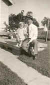 Roger & Carl Weir - 10 months old- on bach porch next to well pump abt June 1942.jpg (1145480 bytes)
